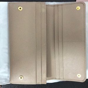 Prada wallet in cameo color